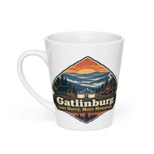 Gatlinburg and the Smokies Latte Mug: Gatlinburg. Less Hurry, More Mountain, Scenic Shield Badge - 12 oz - Main