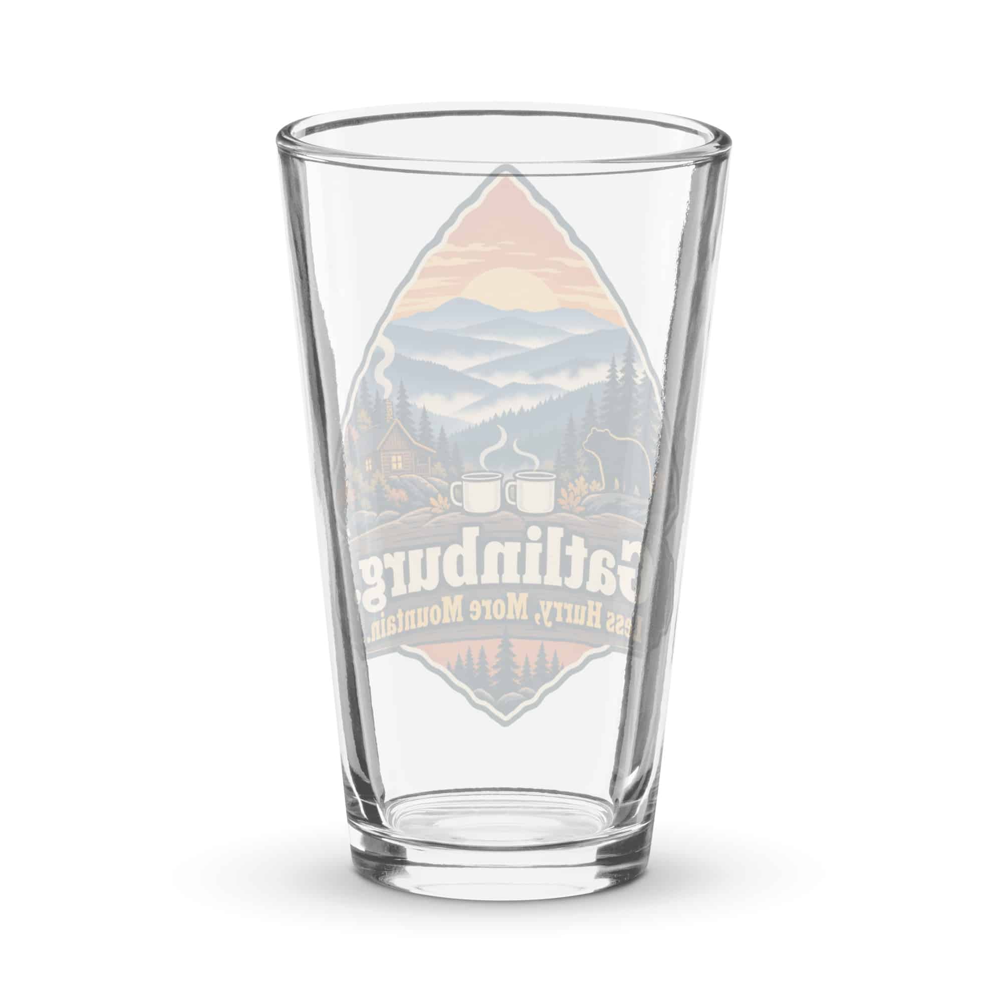 Gatlinburg and the Smokies Pint Glass: Gatlinburg. Less Hurry, More Mountain, Scenic Shield Badge