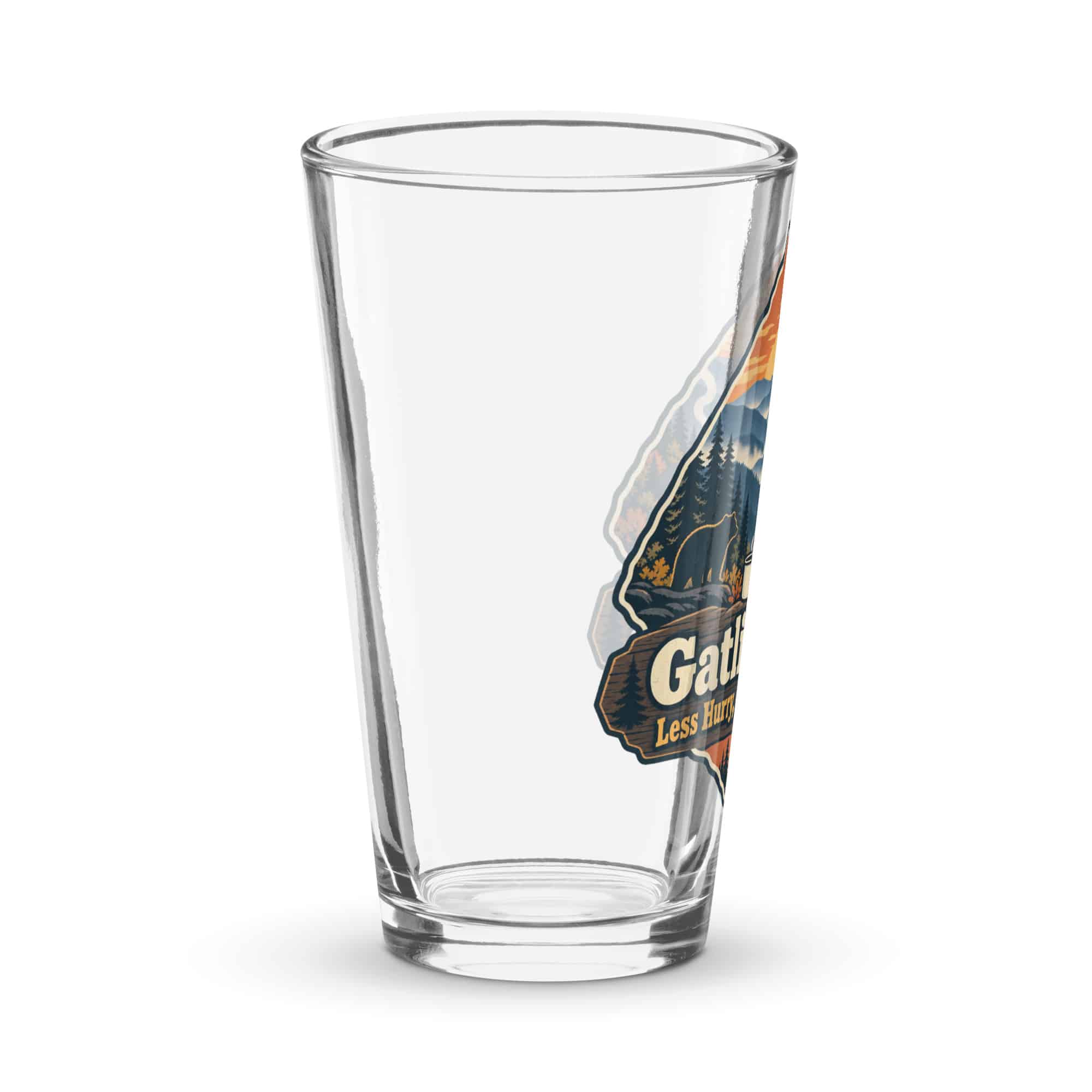 Gatlinburg and the Smokies Pint Glass: Gatlinburg. Less Hurry, More Mountain, Scenic Shield Badge