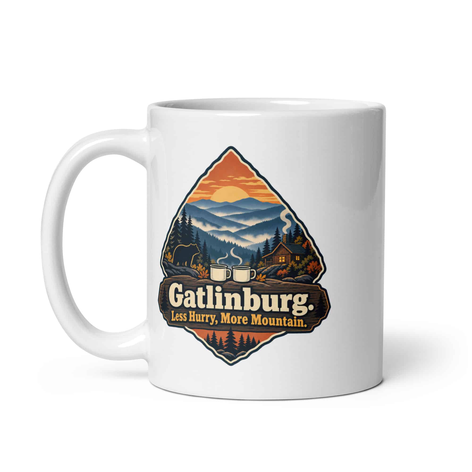 Gatlinburg and the Smokies White Ceramic Coffee Mug: Gatlinburg. Less Hurry, More Mountain, Scenic Shield Badge