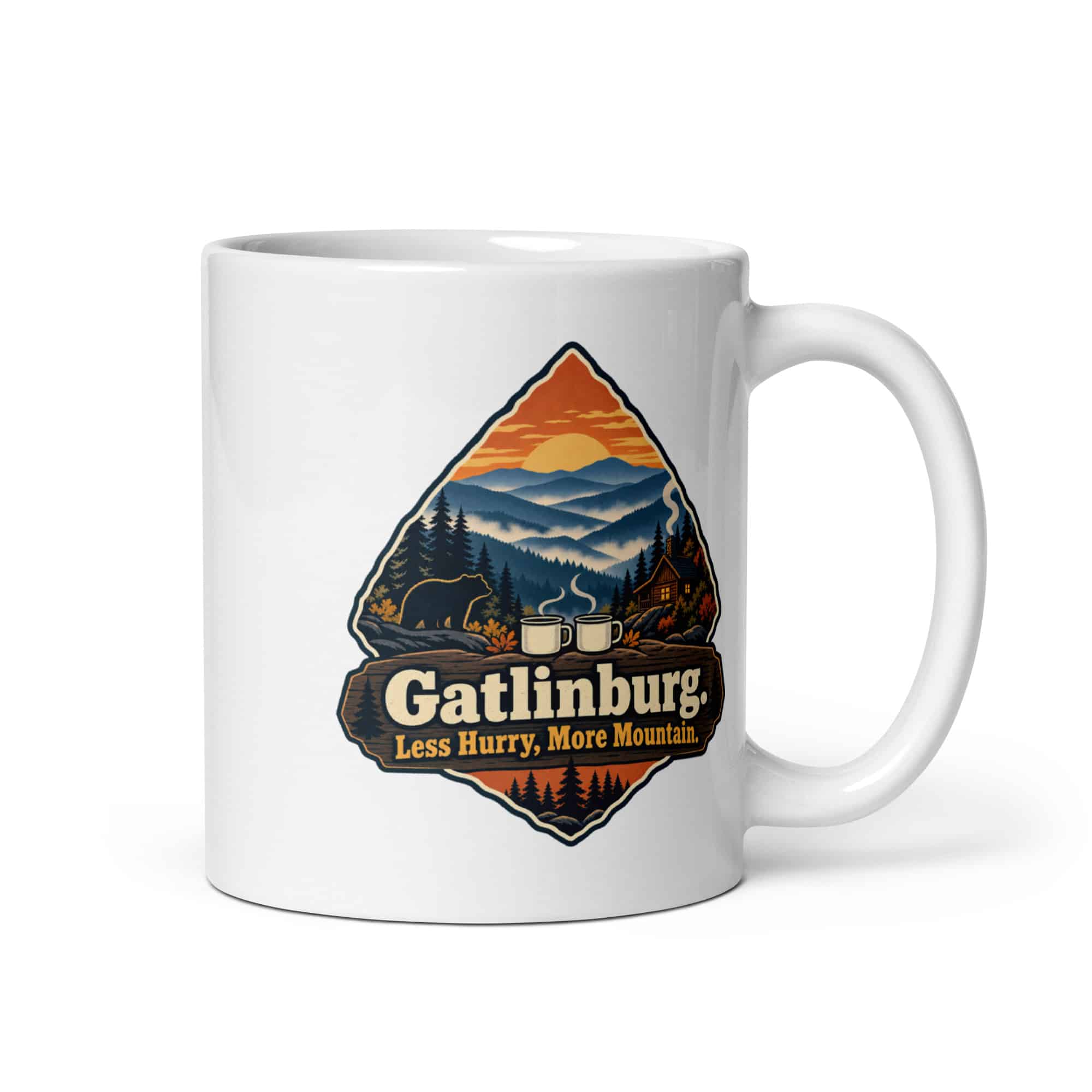 Gatlinburg and the Smokies White Ceramic Coffee Mug: Gatlinburg. Less Hurry, More Mountain, Scenic Shield Badge