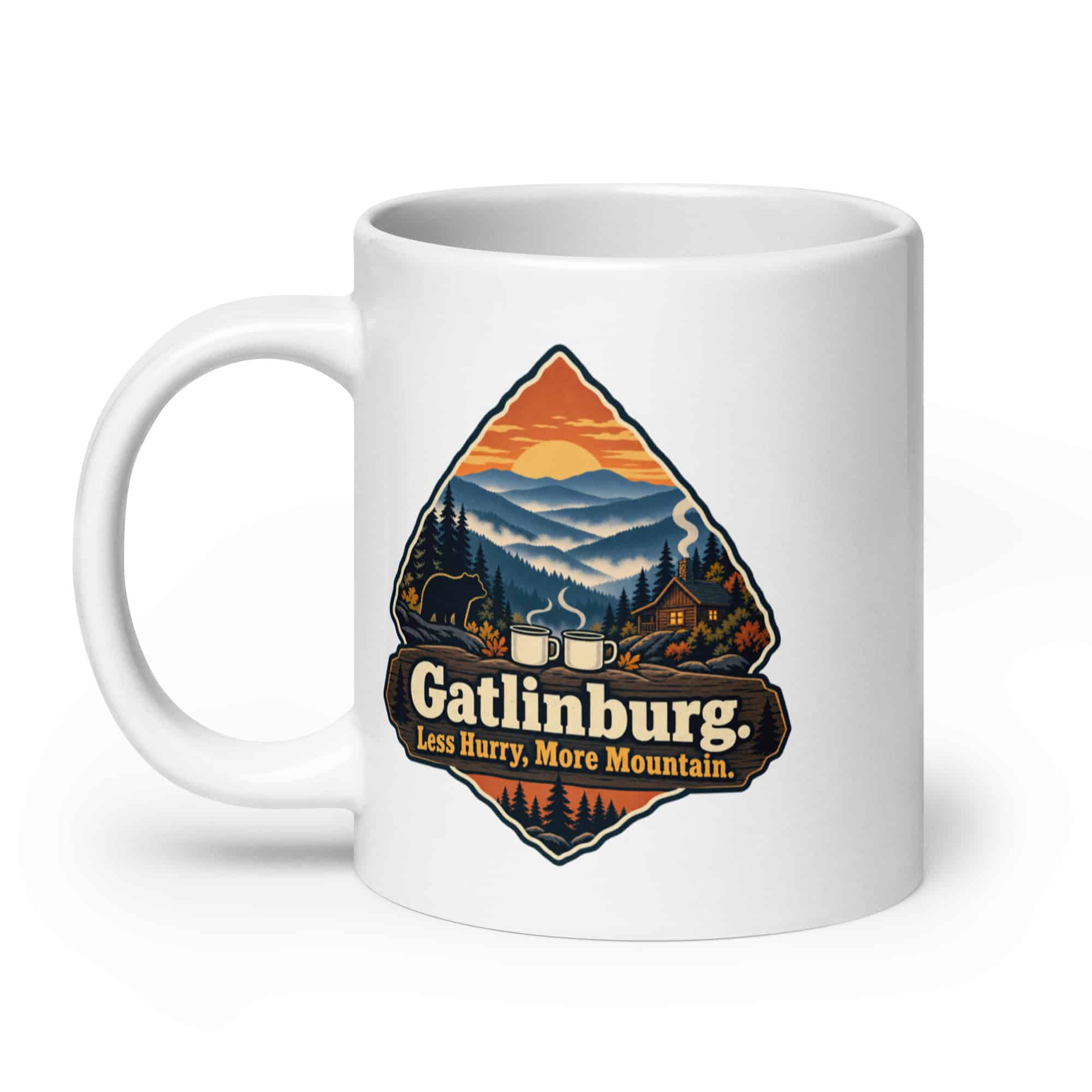 Gatlinburg and the Smokies White Ceramic Coffee Mug: Gatlinburg. Less Hurry, More Mountain, Scenic Shield Badge
