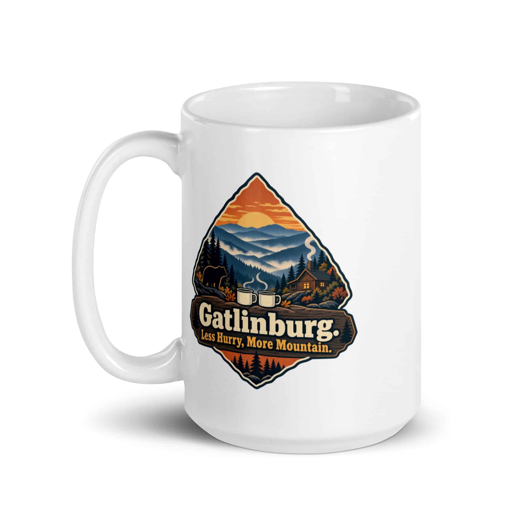 Gatlinburg and the Smokies White Ceramic Coffee Mug: Gatlinburg. Less Hurry, More Mountain, Scenic Shield Badge