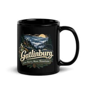 Gatlinburg and the Smokies Black Coffee Mug: Gatlinburg. Less Hurry, More Mountain, Woodland Scenic Lettering - 11 oz - Handle on Right