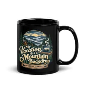 Gatlinburg and the Smokies Black Coffee Mug: My Vacation Has a Mountain Backdrop, Woodland Scenic Lettering - 11 oz - Handle on Right