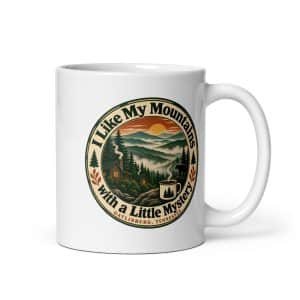 Gatlinburg and the Smokies White Ceramic Coffee Mug: I Like My Mountains with a Little Mystery, Vintage Round Badge - 11 oz - Main