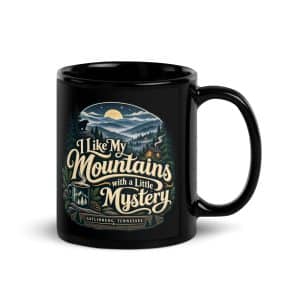 Gatlinburg and the Smokies Black Coffee Mug: I Like My Mountains with a Little Mystery, Woodland Scenic Lettering - 11 oz - Handle on Right