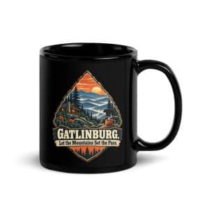 Gatlinburg and the Smokies Black Coffee Mug: Gatlinburg. Let the Mountains Set the Pace, Scenic Shield Badge - 11 oz - Handle on Right