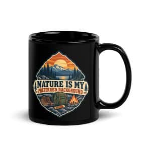 Nature and Adventure Black Coffee Mug: Nature Is My Preferred Background, Scenic Shield Badge - 11 oz - Handle on Right