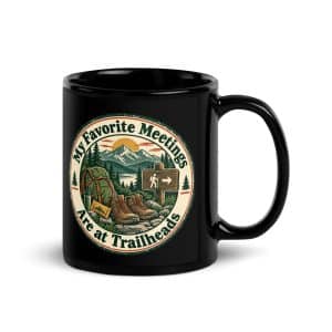 Nature and Adventure Black Coffee Mug: My Favorite Meetings Are at Trailheads, Vintage Round Badge - 11 oz - Handle on Right